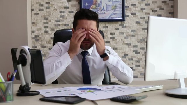 Patient is Tired Stressed Businessman at Work
