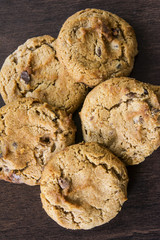 Cookies on dark wooden background