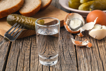 pickled cucumbers and shot of vodka