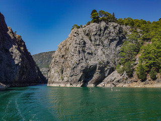 Plakat Turquoise lake and mountains. Turkish Green Canyon 