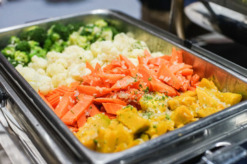 Mixed vegetable metal tray in resturant, Healthy food for vegeterian man in shop.