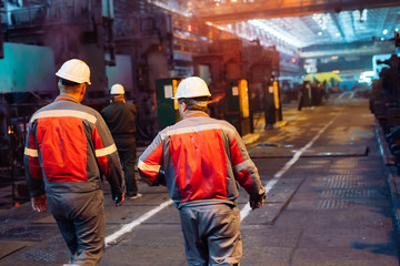 Workers in the steel mill.