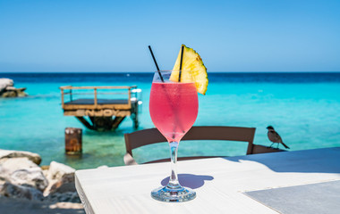   A pretty pink cocktail Curacao Views - a small Caribbean Island