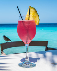   A pretty pink cocktail Curacao Views - a small Caribbean Island