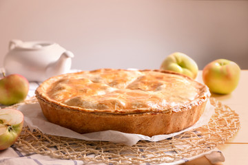 Delicious apple pie on table