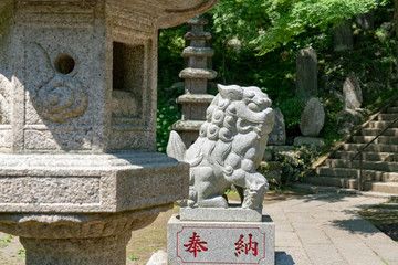 Guardian lion-dog at Shinto shrine at Kenchoji, Kamakura, Kanagawa, Japan 鎌倉 建長寺の狛犬