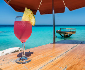   A pretty pink cocktail Curacao Views - a small Caribbean Island