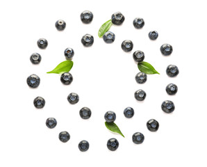 Frame made of ripe blueberries on white background