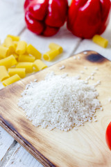 Kitchen board with a dry raw rice