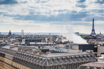 Fototapeta na wymiar The beautiful Paris City seen from a rooftop in a cold winter day