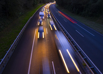 Cars on highway in traffic jam at night