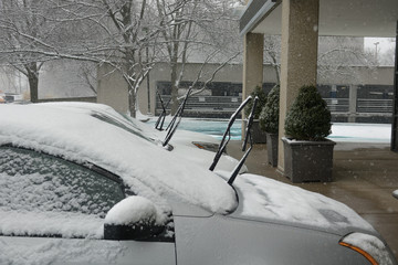 Windshield Wipers Up during a winter storm weather. 
