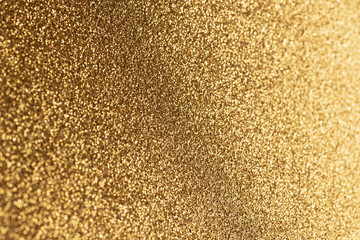 Detailed texture of glittering golden dust surface for christmas