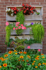 Pallet Flower Garden on brick wall