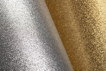 Detailed texture of glittering silver and gold dust surface for christmas