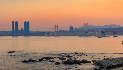 Colorful sunset over Gwangandaegyo (Diamond Bridge), a suspension bridge, Busan city, Korea