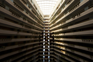 Beautiful sun rays break through the glass window giving dramatic effect to the building