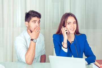 Man listening to woman having private call