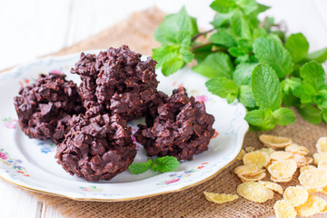 Homemade chocolate snacks with nuts and raisins