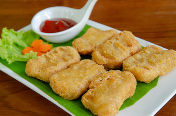 Fried chicken nuggets with tomato sauce. Delicious Dish