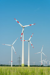 Wind energy generators in a wide open landscape in Germany