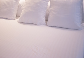 Fototapeta na wymiar Luxury hotel bed sheets pillows