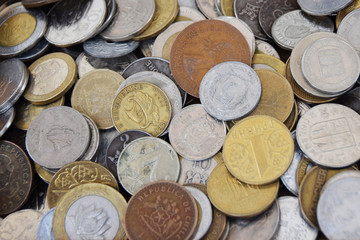 old coins from various parts of the world withdrawn from circulation