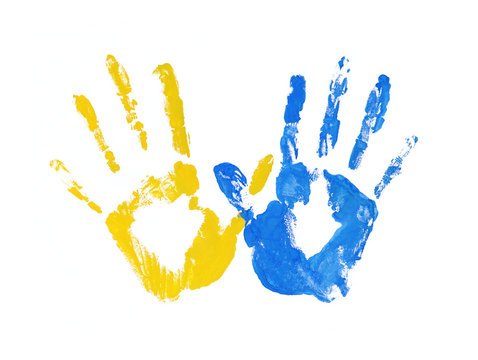 handprints in the form of a flag of Ukraine, image of unity, freedom, independence. yellow and blue ink imprint