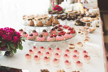 Different kinds of baked sweets on a buffet