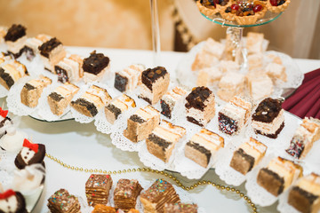 Different kinds of baked sweets on a buffet