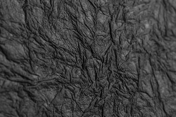 black crumpled paper texture background handmade