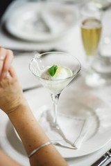 Desserts and wedding cake with very sweet cupcakes at an event.
