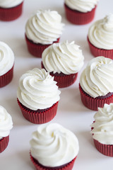 Red velvet cupcakes. cupcakes topped with swirl of sweet vanilla frosting