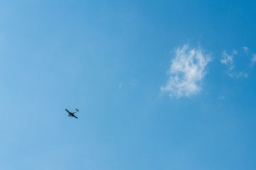 Blue propeller plane background