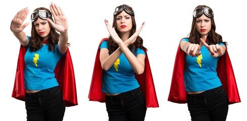 Set of Pretty superhero girl making NO gesture