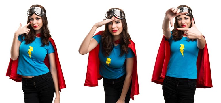 Set of Pretty superhero girl showing something © luismolinero