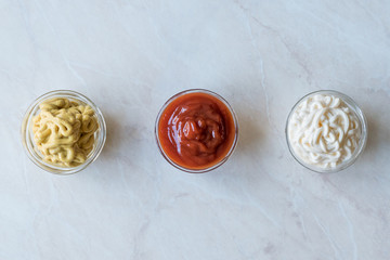 Set of Three Classic Sauce Ketchup, Mayonnaise and Mustard in Small Glass Bowls