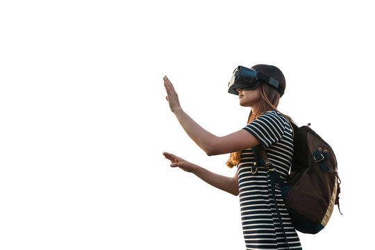 Girl With A Backpack In Virtual Glasses Is Isolated On White Background. Virtual Travel With The Help Of New Technologies.