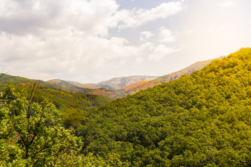 Landscape of Valley of Jerte in Extremadura, Spain. Views of the beautiful mountains full of vegetation during a sunny day with a lot of sunlight.