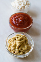 Set of Three Classic Sauce Ketchup, Mayonnaise and Mustard in Small Glass Bowls