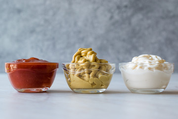 Set of Three Classic Sauce Ketchup, Mayonnaise and Mustard in Small Glass Bowls