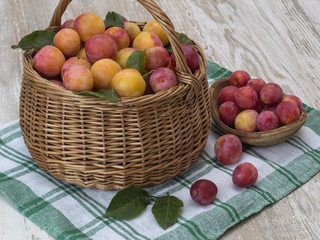 plum from the garden on a wooden background. 