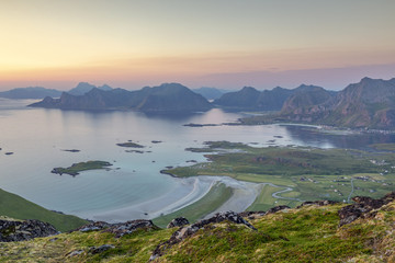 Beautiful sunset view from the top of the mountain near Kvalvika beach in Lofotens, Norway