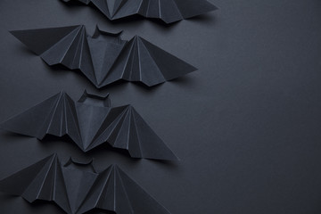 Halloween spooky dracula bats background made from origami