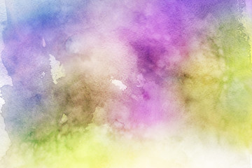 Colorful watercolor ombre leaks and splashes texture on white watercolor paper background. Natural organic shapes and design.