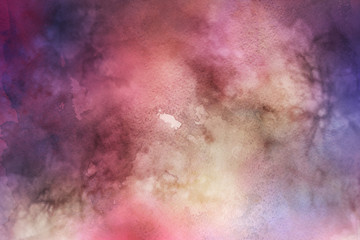 Obraz premium Colorful watercolor ombre leaks and splashes texture on white watercolor paper background. Natural organic shapes and design.
