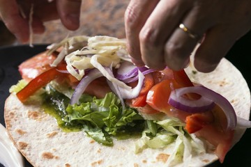 Making of tortilla. Home cooking.