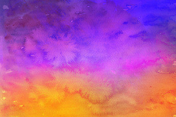 Colorful watercolor ombre leaks and splashes texture on white watercolor paper background. Natural organic shapes and design.