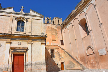 Fototapeta na wymiar Italy, Puglia region, Massafra, typical church in the historic center of the city. View of the facades.