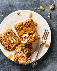 Homemade organic nut dessert with raisins. Top view.